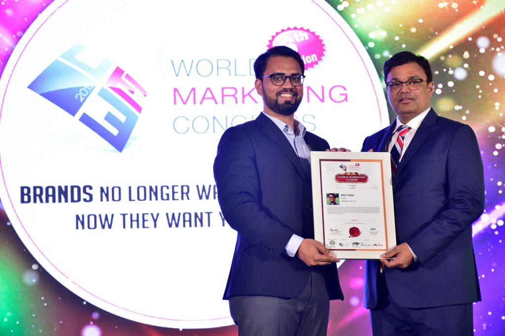 Razy Shah receives his Most Influential Global Marketing Leader award in Mumbai in 2019.